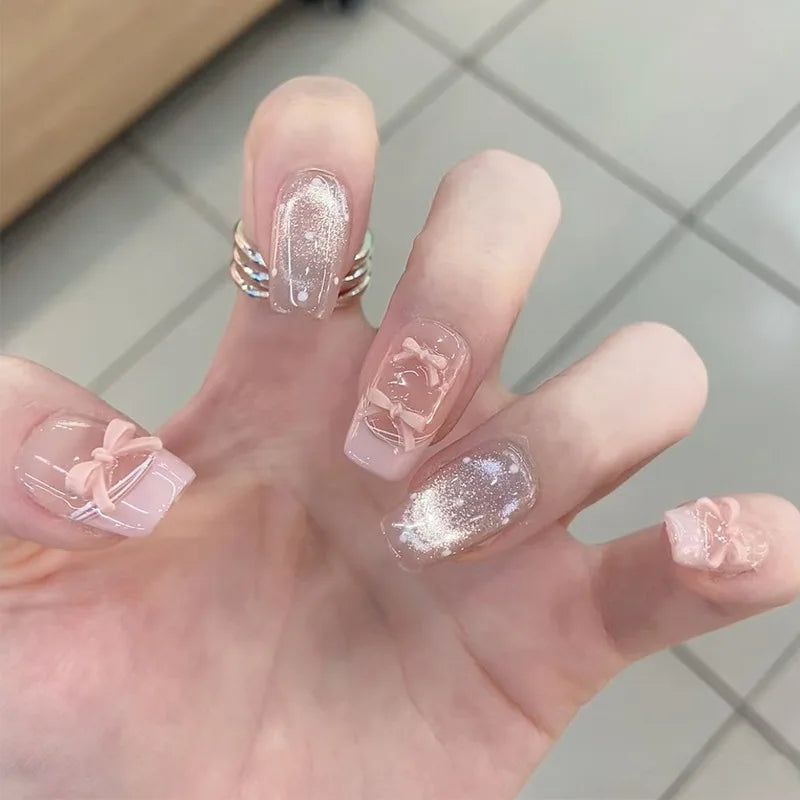 24pcs cute girly short square false nails with white French tips, glitter stars, rhinestones, cat eye, and bows