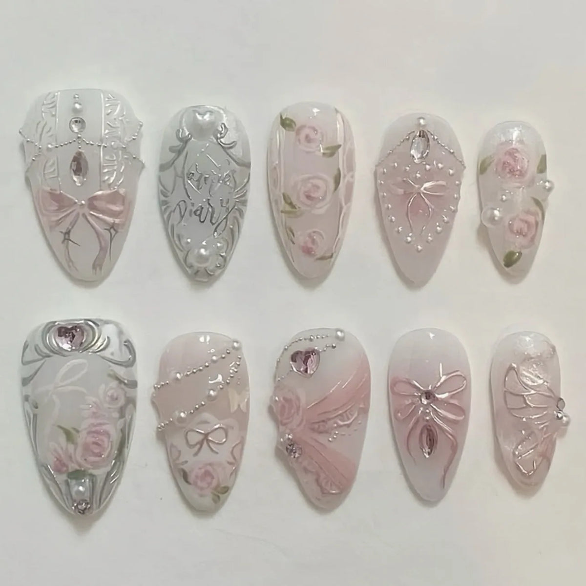 24-piece pink almond false nail patches with bowknot, love heart, and pearl design by HSF Marketplace
