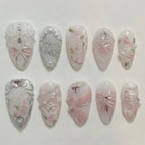24-piece pink almond false nail patches with bowknot, love heart, and pearl design by HSF Marketplace
