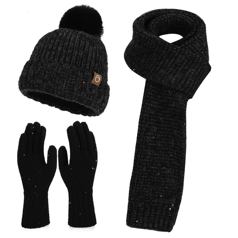 Women's wool knit neck scarf, gloves and cap set in a coordinated winter warmth design