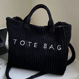 Large capacity striped velvet handbag for women by HSF Marketplace, featuring spacious interior and soft textured fabric