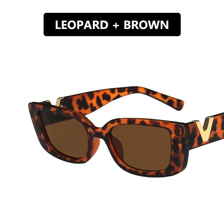 Vintage black rectangle sunglasses for women with small frame, designer style from HSF Marketplace.