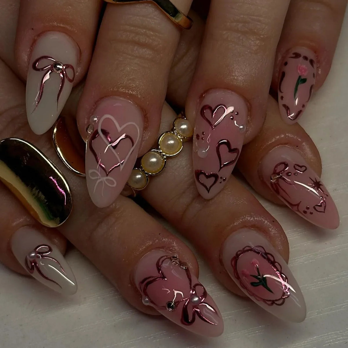 Pink almond press-on false nails with bowknots, love hearts and pearl design, 24-piece detachable set by HSF Marketplace