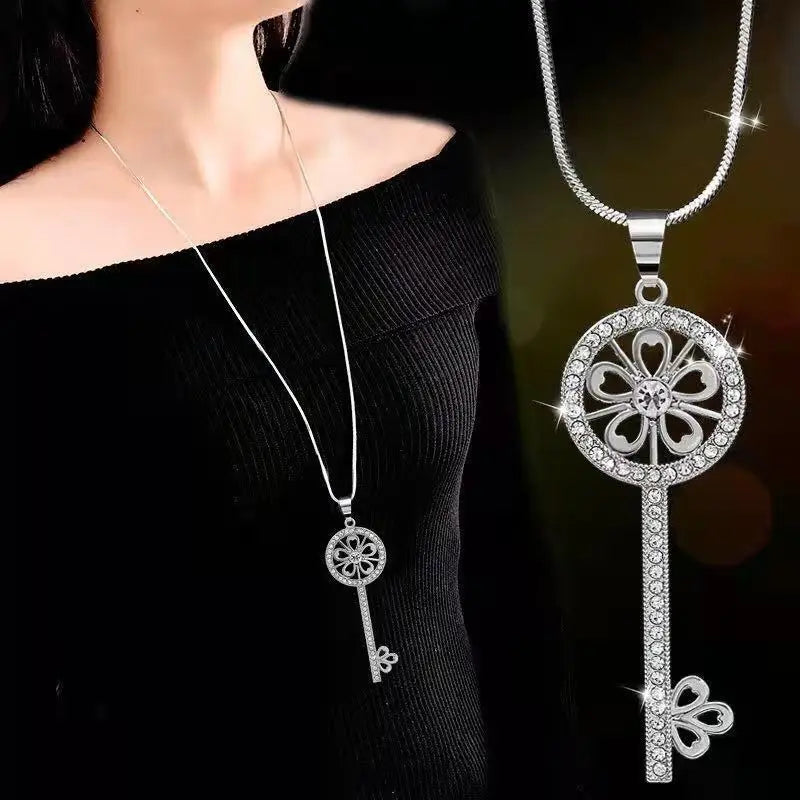 Geometric crystal statement long necklace with pearls, stylish jewelry for women, featuring a modern pendant design.