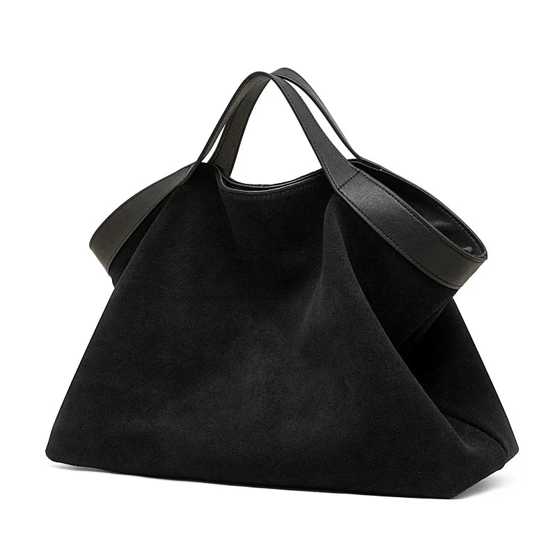 Genuine leather women's handbag with large capacity, shoulder strap, crossbody style, stylish cowhide tote for commuting and everyday use.