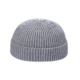 Warm knitted melon hat, unisex winter beanie with a cozy textured design in a classic rounded shape