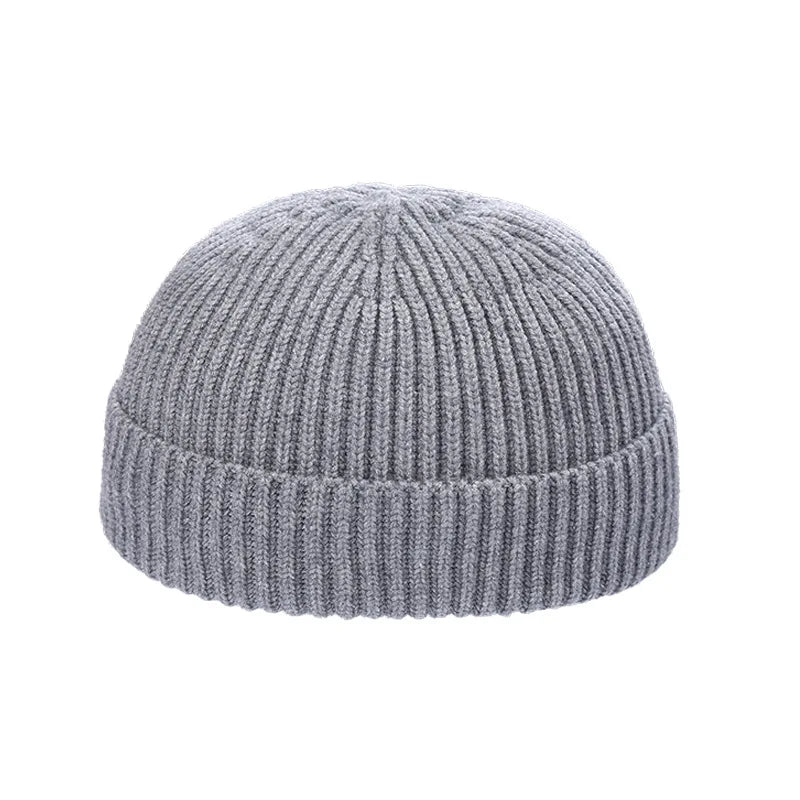 Warm knitted melon hat, unisex winter beanie with a cozy textured design in a classic rounded shape