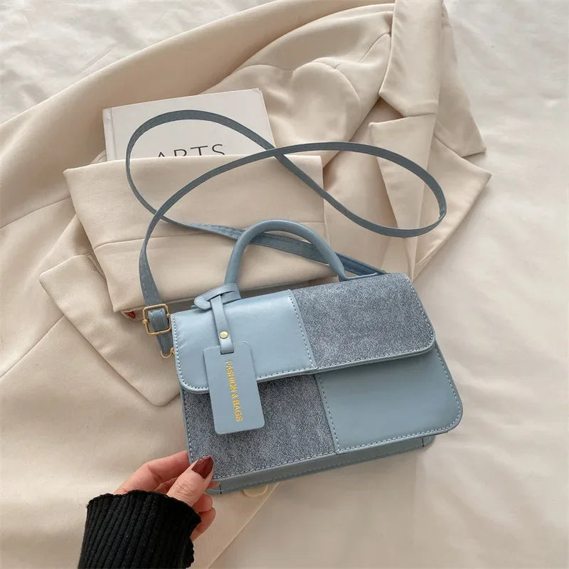 Elegant women's crossbody handbag with geometric pattern, snap closure, stylish shoulder bag for everyday use by fashion lovers.