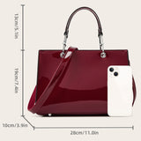 Luxury women's faux leather handbag in black, wine red, champagne, or green featuring elegant design for business and office use.