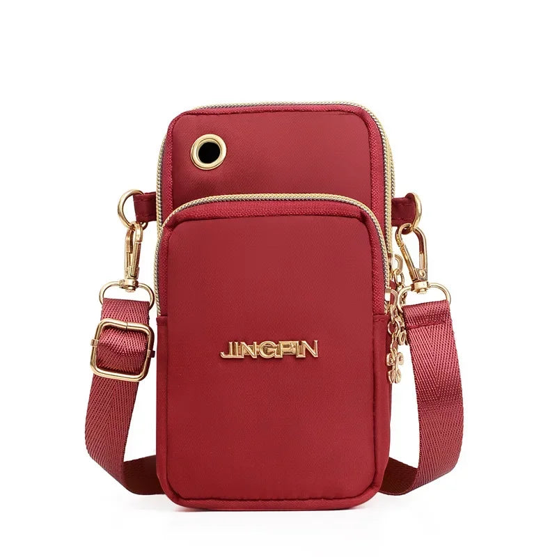 Women's HSF Marketplace crossbody mobile phone bag with 3 layers, coin pocket, and shoulder strap, stylish and compact purse.