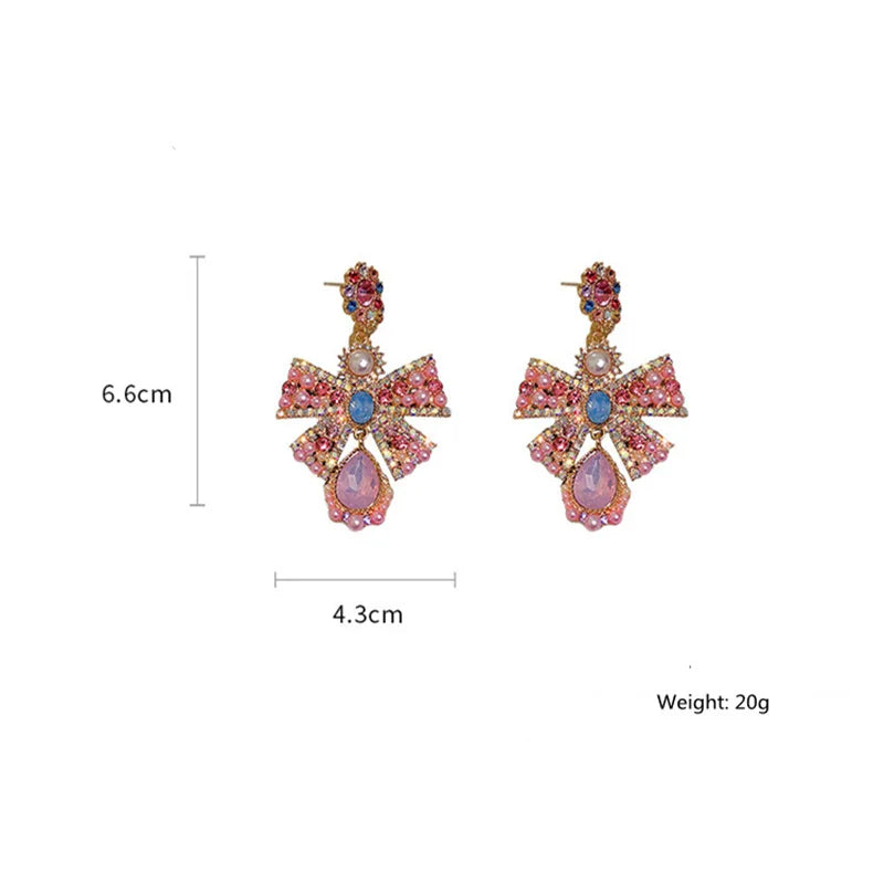 Pink crystal bowknot drop earrings for women, trendy statement jewelry by HSF Marketplace