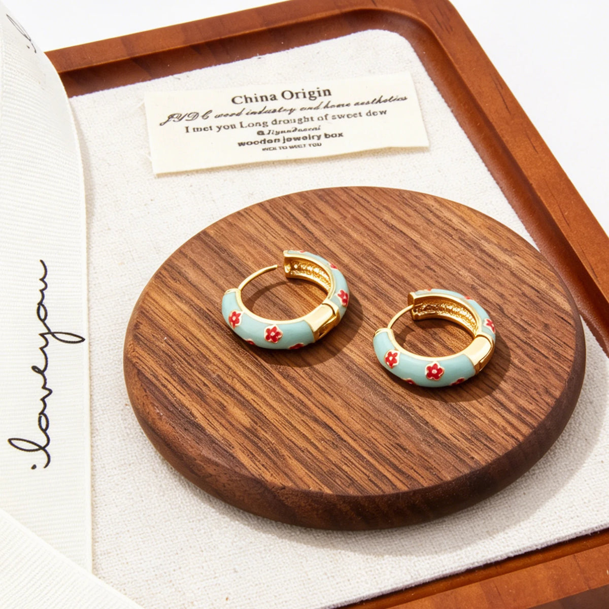 Flower cloisonné hoop earrings for women in bohemian style, featuring colorful floral enamel details