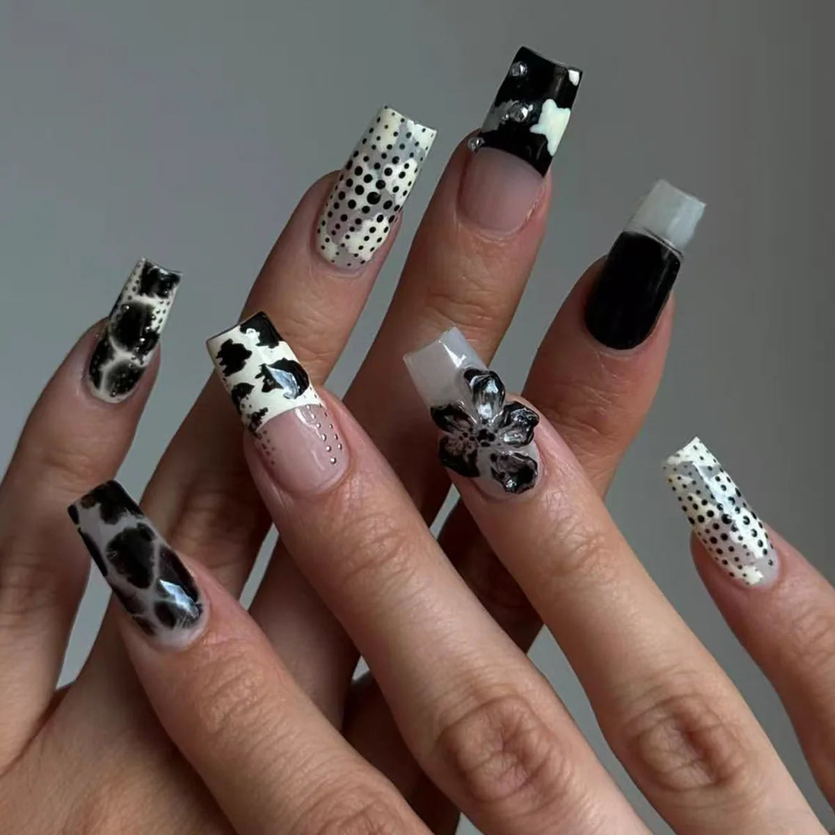 24-piece Sweet Punk long coffin press-on nails with pink and black French polka dot striped design