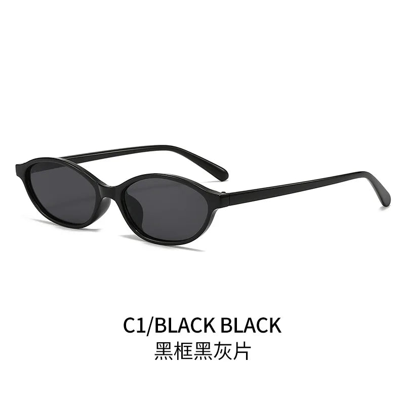 Retro oval frame sunglasses by HSF Marketplace with small trendy punk cat eye design and sunshade protection.