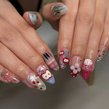 24-piece pink almond press-on false nails with bowknots, love hearts, and pearl design by HSF Marketplace