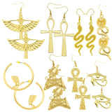 Vintage gold Egyptian queen hoop earrings by HSF Marketplace, elegant jewelry design
