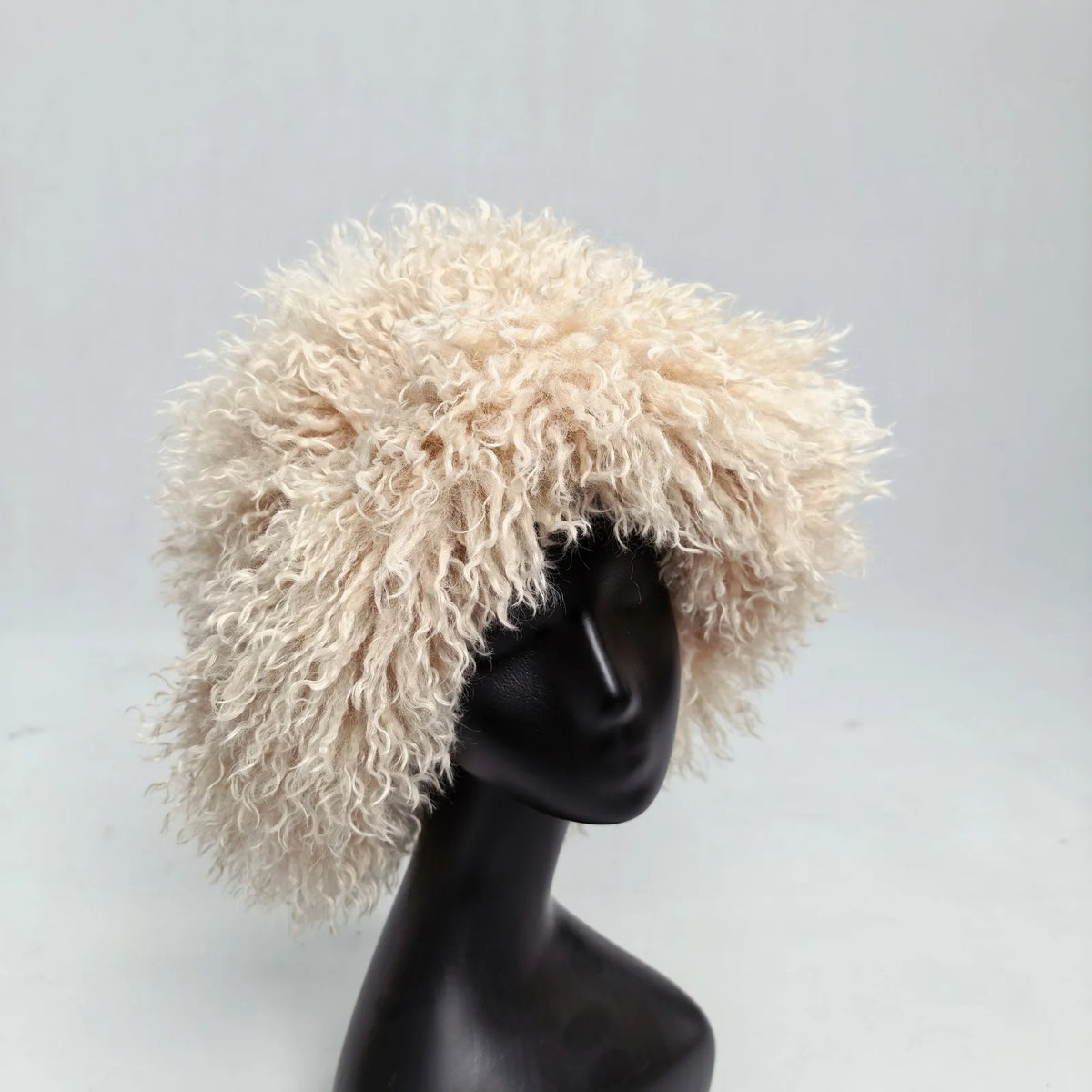 Women's trendy faux wool curly fur bucket hat by HSF Marketplace, soft textured design in close-up view