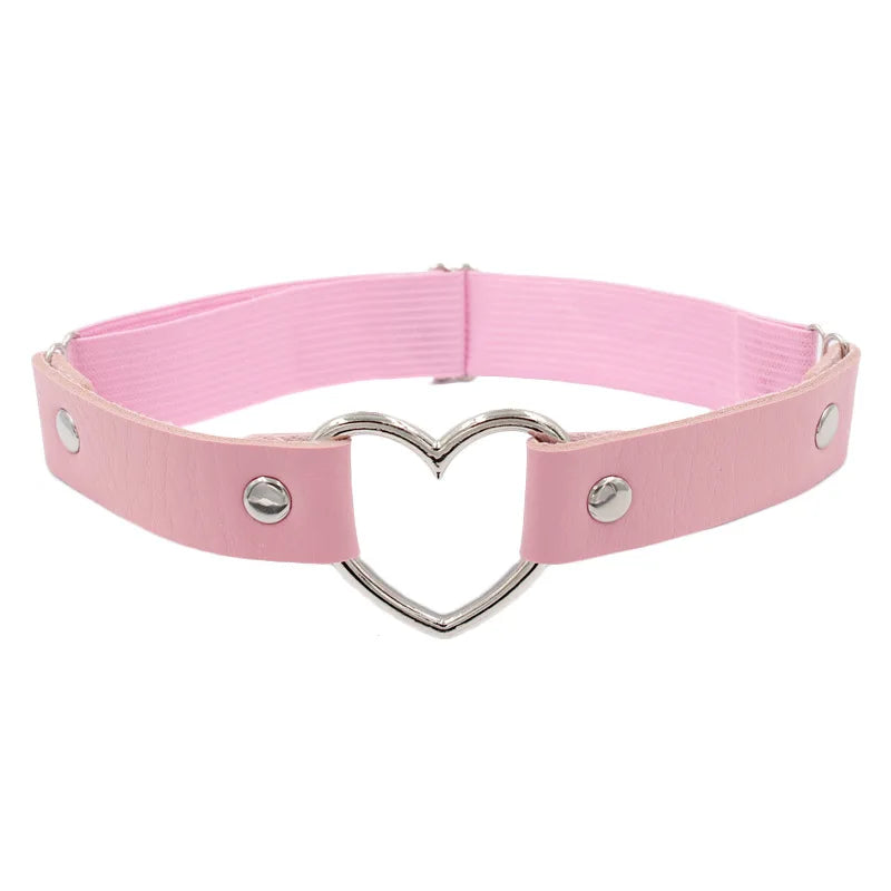 Women’s PU leather leg ring garter with heart rivets, spikes, and adjustable thigh strap in punk goth style