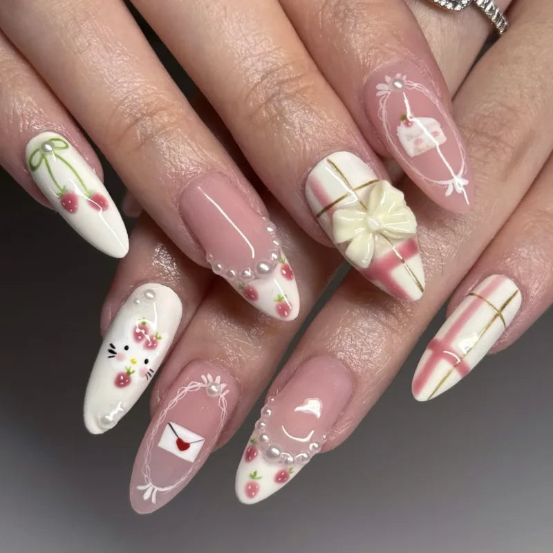 24-piece pink almond false nail tips with bowknot, love heart, and pearl designs by HSF Marketplace