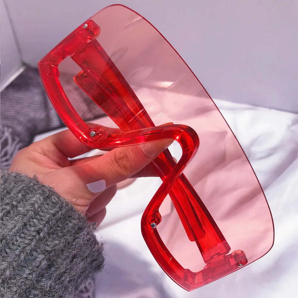 Red and yellow oversized sunglasses for women featuring a shield design, trendy and fashionable hip hop style by HSF Marketplace.