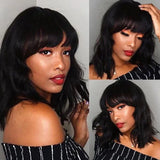Natural wavy human hair wig with bangs, loose waves, curly texture, and lace front, made from Brazilian Remy hair for women.