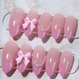 24-piece pink almond false nail patches with bowknots, love hearts and pearl design by HSF Marketplace