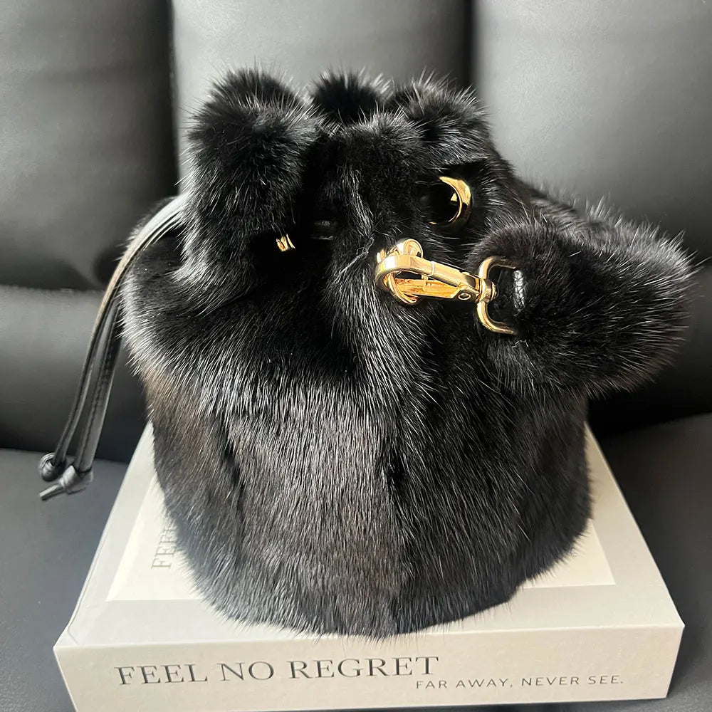 Luxurious real mink fur bucket handbag for women, fluffy evening bag with crossbody strap, perfect for winter luxury fashion.