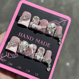10-piece short duck bill press-on false nails with pink French tips, 3D butterfly flowers, pearls, hearts, and rhinestones
