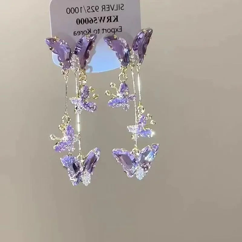 Purple butterfly drop earrings with rhinestone details by HSF Marketplace