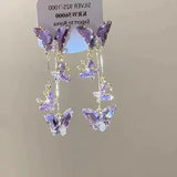 Purple butterfly drop earrings with rhinestone details by HSF Marketplace