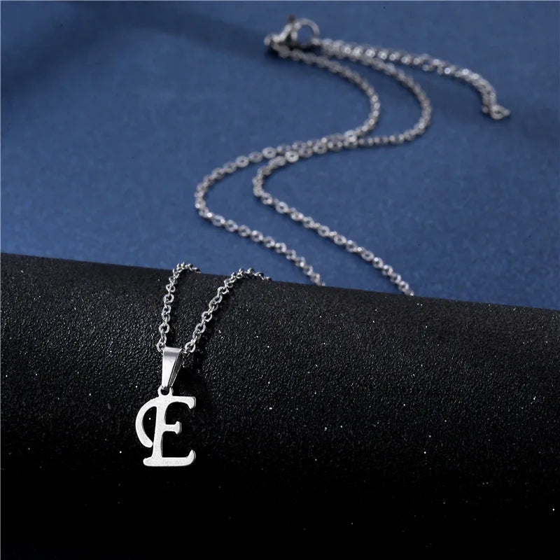 Shiny stainless steel initial letter pendant necklace for women, featuring a simple glossy clavicle chain choker jewelry.