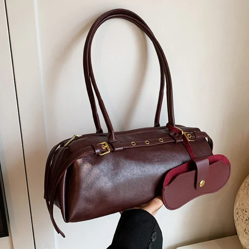 Fashion PU shoulder handbag with buckle decoration, large capacity, solid color, all-match design for women.