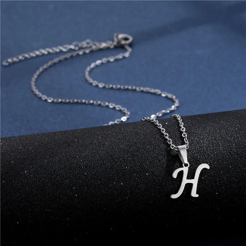 Shiny stainless steel initial letter pendant necklace for women with a simple choker chain, elegant jewelry by HSF Marketplace