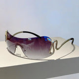 Y2K rimless sunglasses for women by HSF Marketplace featuring snake-ray metal legs, gradient lenses, and wrap-around punk style eyewear.
