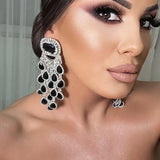 Bridal black crystal tassel earrings with elegant dangling design for women