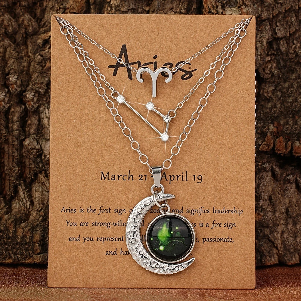 Set of three zodiac moon glow pendant necklaces with birthstone cards, ideal for birthday gifts and friendship jewelry.