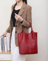 Genuine cowhide leather tote bag for women in luxury commuter style, featuring a structured design and sturdy handles