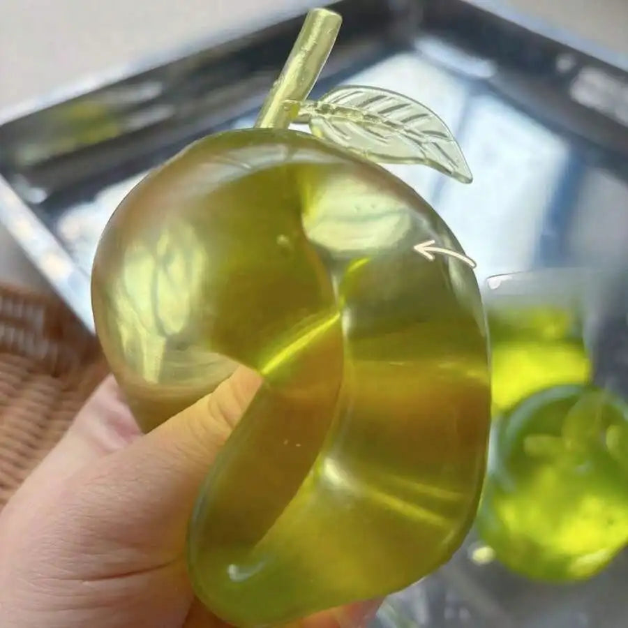 Green apple squishy toy by HSF Marketplace for stress relief and aesthetic decor