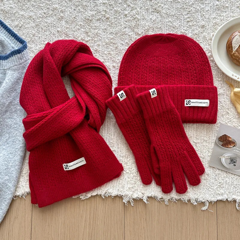 Women's soft cashmere knitted wool hat, scarf and gloves winter set in a coordinated design