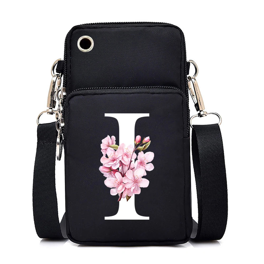 Women's Sakura alphabet floral crossbody bag by HSF Marketplace with colorful letter graphics and mobile phone compartment.