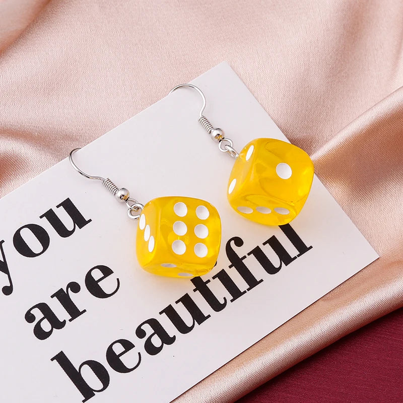 White and black square dice earrings for women, featuring playful digital dice designs and dangling jewelry details