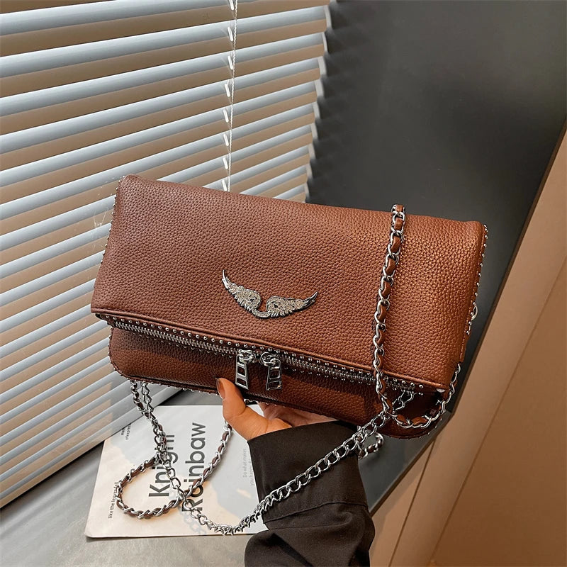 Small square women’s crossbody bag with retro chain design by HSF Marketplace