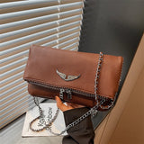 Small square women’s crossbody bag with retro chain design by HSF Marketplace