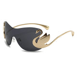 Y2K trendy women's oversized rimless sunglasses by HSF Marketplace with gradient lenses and stylish swan inlay design.