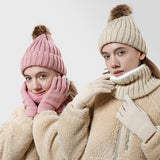 Women’s knitted winter hat, scarf and gloves set in a warm matching design for outdoor wear