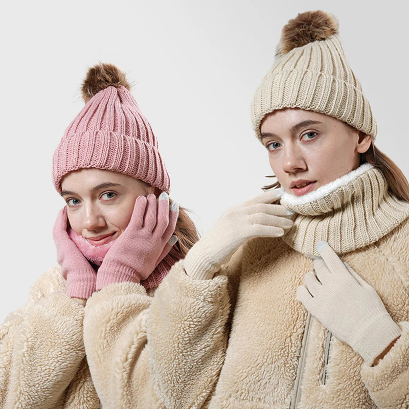 Women’s knitted winter hat, scarf and gloves set in a warm matching design for outdoor wear