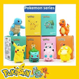Pokemon blind box with six Pet Elves figures, including Pikachu, Koda, duck, car ornaments, and Bao Kemeng toys
