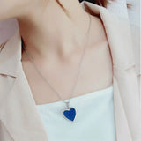 Heart-shaped mood locket necklace by HSF Marketplace with color-changing stainless steel pendant and photo insert, romantic jewelry piece.