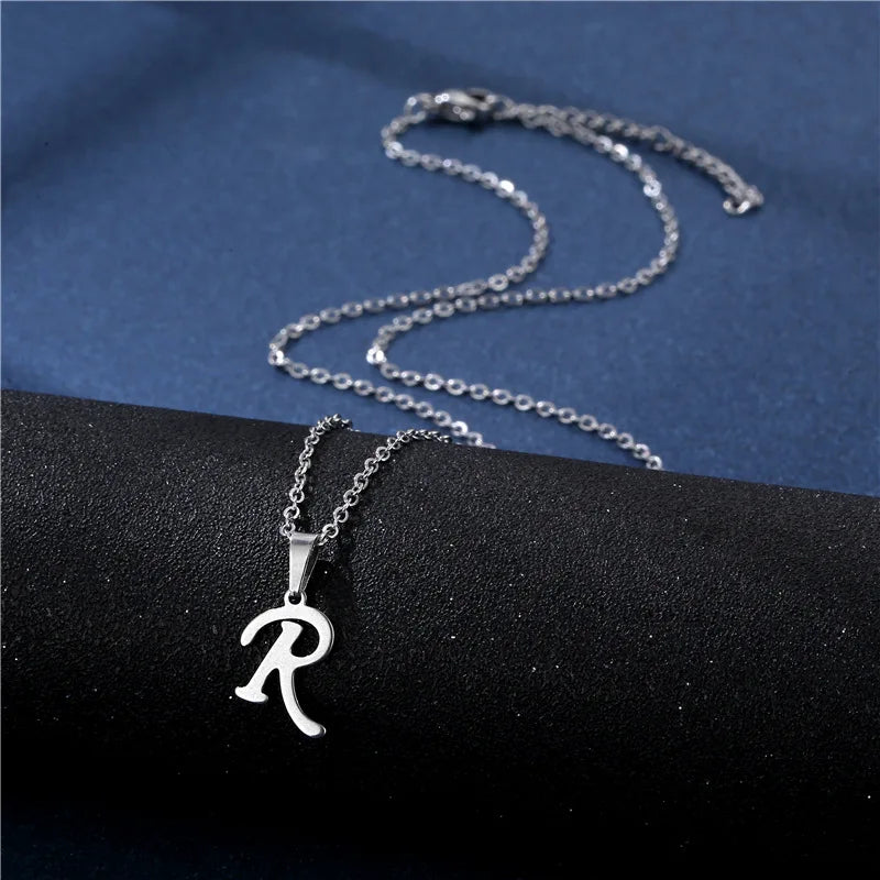 Shiny stainless steel initial letter pendant necklace for women, featuring a simple chain choker jewelry design.