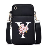 Sakura alphabet floral graphics small crossbody bag for women, with a mobile phone pocket and stylish messenger design.